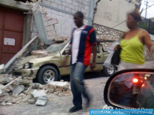 «емлетр¤сение на √аити: столица в руинах, тыс¤чи пострадавших